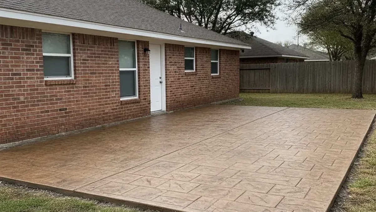 A stamped concrete patio in Mesquite has a stone-style pattern with defined joints and borders.
